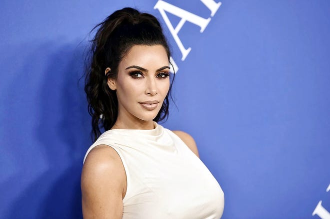 In this June 4 file photo, Kim Kardashian West arrives at the CFDA Fashion Awards at the Brooklyn Museum in New York. The reality star successfully appealed to President Donald Trump to release Alice Marie Johnson from prison. Johnson, who spent more than two decades in federal prison on 1996 drug convictions and was not eligible for parole, had her sentence commuted this week. [EVAN AGOSTINI/INVISION/ASSOCIATED PRESS]