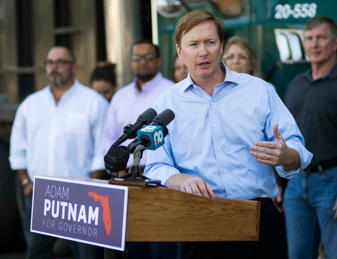 Adam Putnam's office failed to conduct national background checks on tens of thousands of applications for concealed weapons permits for more than a year, according to an Office of Inspector General report released Friday. Putnam is the Commissioner of the Florida Department of Agriculture and Consumer Services, which is charged with conducting background checks on concealed weapons permit applications. [Monica Herndon/Tampa Bay Times]