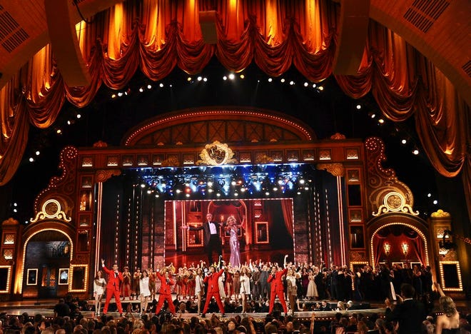 In this June 7, 2015 file photo, the cast of "Jersey Boys" performs at the 69th annual Tony Awards at Radio City Music Hall in New York. The Tony Awards kick off on Sunday, June 10, 2018 with a pair of first-time hosts, no clear juggernaut like â€œHamiltonâ€ to watch but a likely tune-in assist by Bruce Springsteen. Josh Groban and Sara Bareilles face their biggest audience yet and a careful political balancing act when they co-host the CBS telecast from the massive 6,000-seat Radio City Music Hall. (Photo by Charles Sykes/Invision/AP, File)