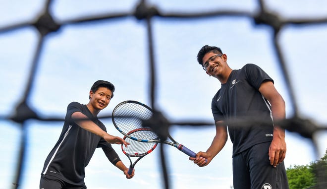 RON JOHNSON/JOURNAL STAR Dunlap tennis duo David Wu, left, and Steve Chacko are the first doubles team to be recognized as the Journal Star Boys Tennis Players of the Year. Wu and Chacko were undefeated against Mid-Illini Conference opponents this season. The won the M-I Conference, the Class 1A Dunlap Section Doubles title, and finished in the top 16 at the State Finals.