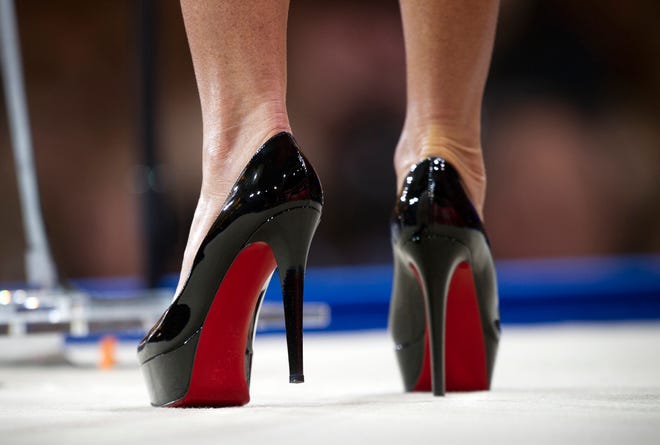 French shoe designer Christian Louboutin won a copyright lawsuit in Europe over the iconic red soles on his shoes. The shoes are seen here on former vice presidential candidate Sarah Palin.