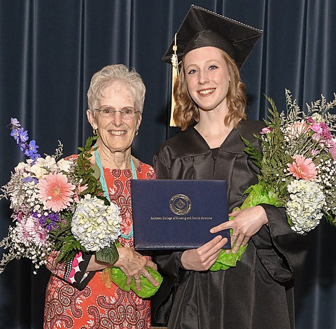 Aultman College’s May graduation was one for the history books as the 1,000th graduates from past and present met. Recent Aultman College graduate Kayla Hollinger, of North Lawrence, right, stands with Carolyn Sue (Bush) Beck, the 1,000th graduate of the Aultman Hospital School of Nursing.