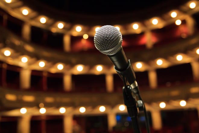 Close up of microphone in concert hall, theater
