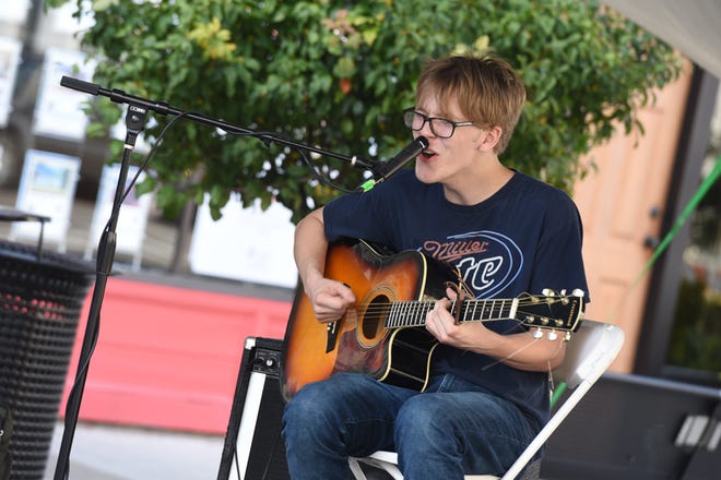 Jacob Scott of Toledo performs at the Hickman Family Foundation Stage in downtown Adrian during Artalicious.
