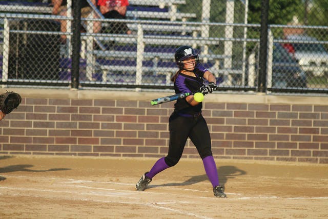 Senior Grace Foxen connecting on one of three hits in the win against Dallas Center-Grimes on Tuesday, June 12. PHOTO BY ANDREW BROWN/DALLAS COUNTY NEWS