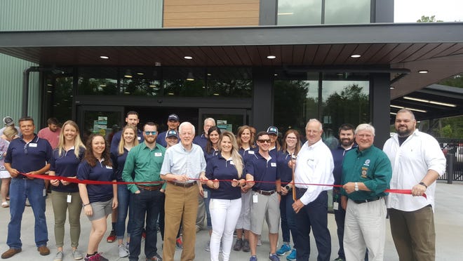 The Lexington Area Chamber of Commerce participated in a ribbon cutting ceremony in May for Rock Outdoors located at 7440 N.C. Highway 8 to celebrate its grand opening. Pictured (from left) are Craig Cooper, Jennifer Grigg, Brittany Roberts, Brian Summer, Lexington City Councilman Jim Myers, Brandy Tussey, Brad Hardee, Steve Summer, Davidson County Board of Commissioners Chairman Steve Shell and Lexington Chamber Board Chairman Adam Sewell. [Contributed photo]