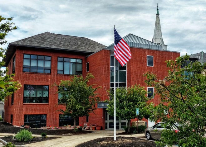 The Rochester Library installed a new flagpole, which is adorned with a brand new flag. [Courtesy Photo]