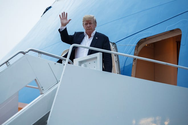 U.S. President Donald Trump arrives at Andrews Air Force Base after a summit with North Korean leader Kim Jong Un in Singapore, Wednesday, June 13, 2018, in Andrews Air Force Base, Me. [AP Photo/Evan Vucci]
