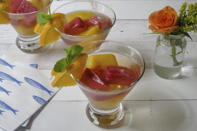Pink sangria uses pureed fruit ice cubes to keep it chilled. [SARA MOULTON/THE ASSOCIATED PRESS]