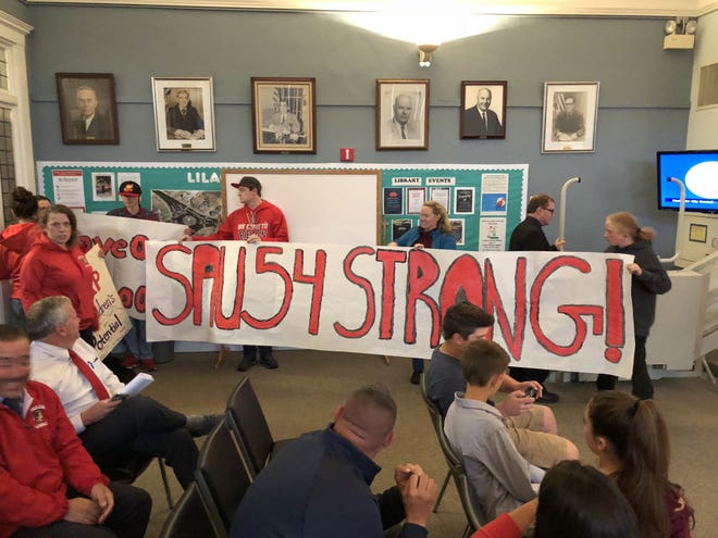 Rochester residents have packed City Hall in recent weeks to call for a tax cap override to save school jobs. An override attempt failed Tuesday by one vote, while another is expected June 19. [Courtesy photo]