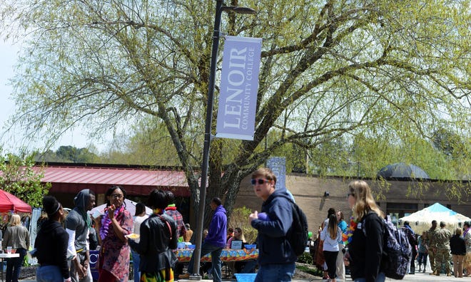 Students walk through the courtyard during Spring Joust at Lenoir Community College. [Janet S. Carter / The Free Press]