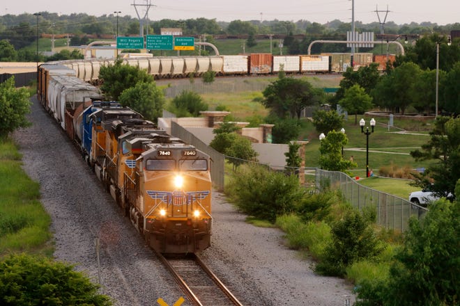 A Union Pacific train moves east, parallel to I-40 near downtown Oklahoma City Wednesday, June 13, 2018. [Doug Hoke/The Oklahoman]
