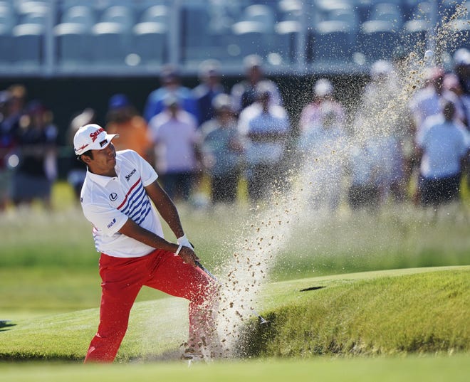 Hideki Matsuyama plays a shot from a bunker on the 13th hole during the first round of the U.S. Open on Thursday in Southampton, N.Y. [CAROLYN KASTER/THE ASSOCIATED PRESS]