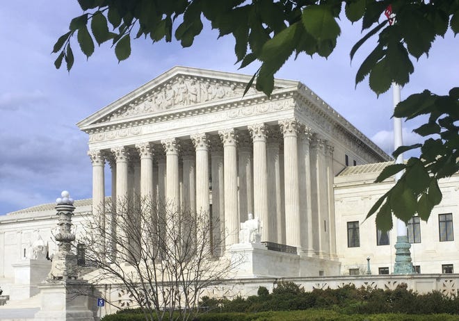 FILE - This April 23, 2018, file photo shows the Supreme Court in Washington. The court ruled on Thursday, June 14, 2018, that U.S. courts do not have to accept as conclusive foreign governmentsþÄô explanations of their own laws. (AP Photo/Jessica Gresko, File)