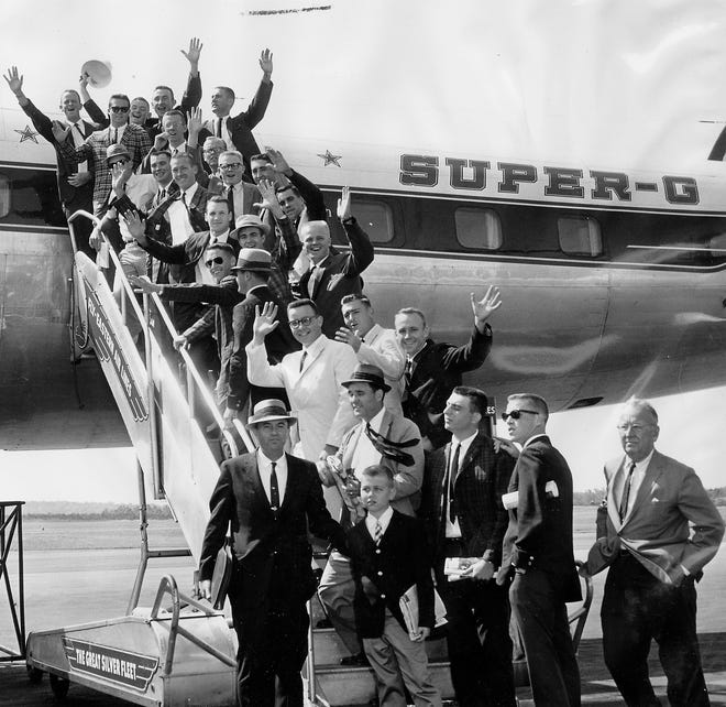 North Carolina's baseball team prepares to board an airplane for Omaha, Neb., in 1960 for the Tar Heels' first College World Series appearance. [UNC athletics photo]