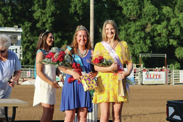 Meghan McBride (left) of West Des Moines, was crowned the 2018 Dallas County Fair Queen and Taylor Peterson (right), of Clive was runner up. The Dallas County Fair Queen Coronation was held right before Night 2 of the Rodeo on Saturday, June 16. PHOTO BY CLINT COLE/DALLAS COUNTY NEWS