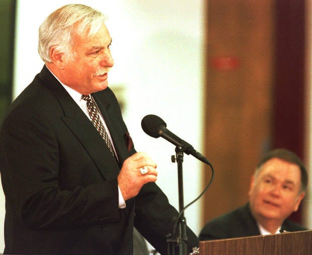 David Boren, right, listens to Howard Schnellenberger at a press conference not long after Boren was installed as OU's president in 1994 and Schnellenberger was named the Sooner football coach. [FILE PHOTO BY DOUG HOKE, THE OKLAHOMAN]