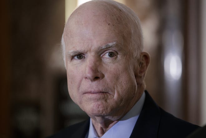 FILE - In this Oct. 25, 2017 file photo, Senate Armed Services Chairman John McCain, R-Ariz., pauses before speaking on Capitol Hill in Washington. A possible U.S. Senate vacancy in Arizona would be temporarily filled by a Republican appointee in the event of the death of Sen. John McCain, who is battling cancer, but it's unclear whether an election would be held in November or 2020. Arizona law requires the governor to appoint someone of the same political party if there is a vacancy. The seat will then be on the ballot for the next general election, but there's conflicting views on whether that means this fall or in 2020. (AP Photo/J. Scott Applewhite, File)