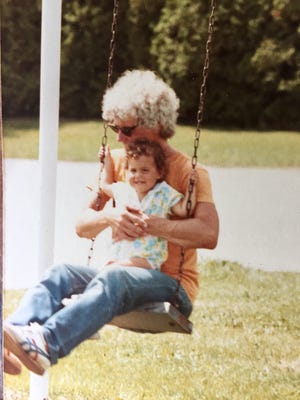 Columnist Lauren Daley and her dad on a playground circa 1984. [Contributed photo]