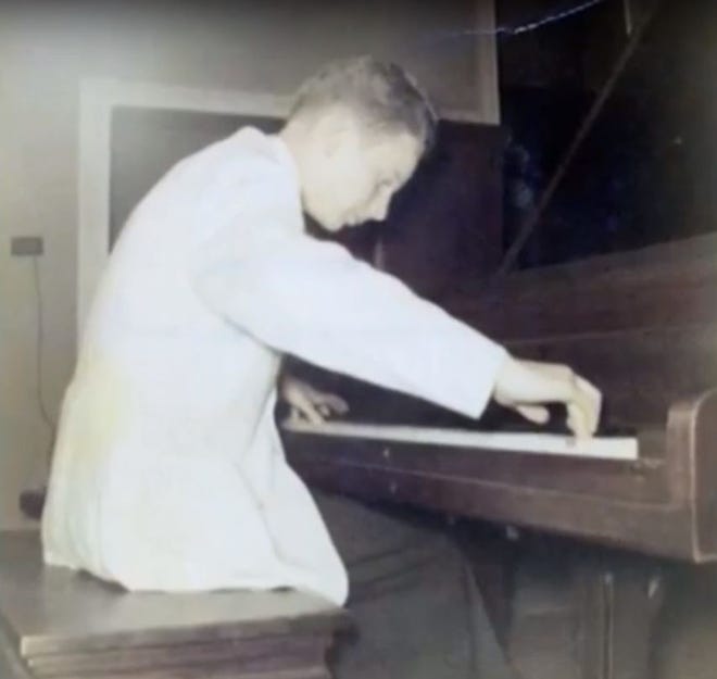 Dad playing piano. [CONTRIBUTED PHOTO]