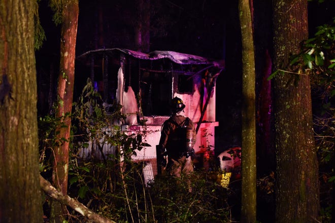 Two people died in a residential fire Friday night on Cotton Lane in DeFuniak Springs, according to the Walton County Sheriff's Office. [WCSO PHOTO]