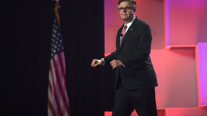 Lt. Gov. Dan Patrick walks onstage during the Republican Party of Texas convention at the Henry B. Gonzalez Convention Center on Friday.