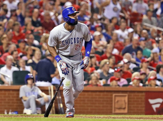 The Chicago Cubs' Jason Heyward drops his bat as he watches his two-run home run during the eighth inning against the St. Louis Cardinals Saturday, June 16, 2018, in St. Louis. [JEFF ROBERSON/THE ASSOCIATED]