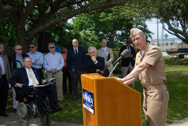 Capt. Michael Coughlin, commanding officer of Naval Undersea Warfare Center Division Newport, speaks Monday during the anouncement of NUWC's partnership with a consortium to encourage faster undersea technology development. [NUWC PHOTO]