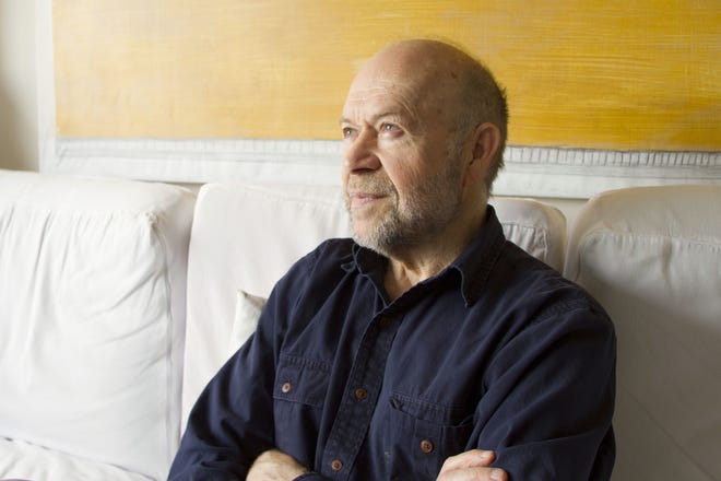 James Hansen sits for a portrait in his home in New York on April 12, 2018. NASA's top climate scientist in 1988, Hansen warned the world on a record hot June day 30 years ago that global warming was here and worsening. In a scientific study that came out a couple months later, he even forecast how warm it would get, depending on emissions of heat-trapping gases. (AP Photo/Marshall Ritzel)
