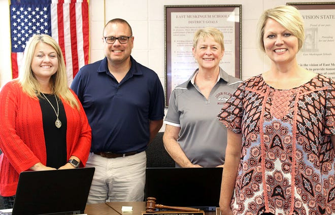 Participating in the Guernsey County Board of Developmental Disabilities mini-grant award to the East Muskingum School District were, l to r, board member Shala Zemba, board member Mike Mathers, board President Gail Requardt and SSA/Medicaid Director Tanya Hitchens.