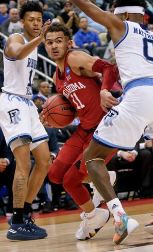Dynamic Oklahoma guard Trae Young could be in play for the Atlanta Hawks with one of its three first-round picks in Thursday’s NBA Draft. (Keith Srakocic/The Associated Press)