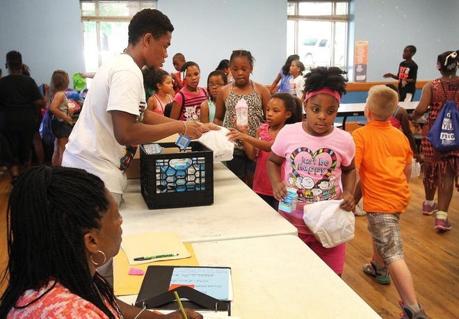 Kids enjoy their lunch at the West Gastonia Boys & Girls Club in June 2016. The location is again participating in the Summer Feeding Program that provides a healthy breakfast and lunch to kids 18 and under in areas of high demand and need in Gaston County. [JOHN CLARK/THE GASTON GAZETTE]