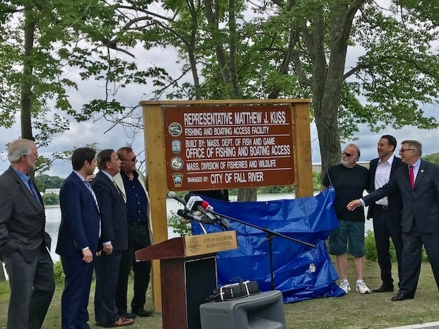 Local and state officials gathered recently at the rededication of the Matthew J. Kuss Sr. Fishing and Boating Facility in Fall River. [Submitted photo]
