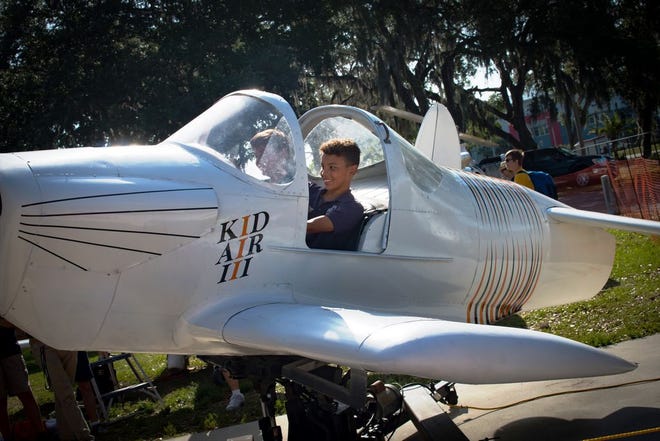 Children at the 2017 Fly Into Summer event at Aerospace Discovery at the Florida Air Museum sit in a model jet fighter. [PHOTO PROVIDED/SUN 'N FUN (2017)]
