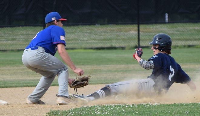 Exeter Post 32 baserunner Ryan Huppe is tagged out on a steal attempt during his team's game against Nashua on Wednesday at Phillips Exeter Academy. [Mike Zhe/Seacoastonline]