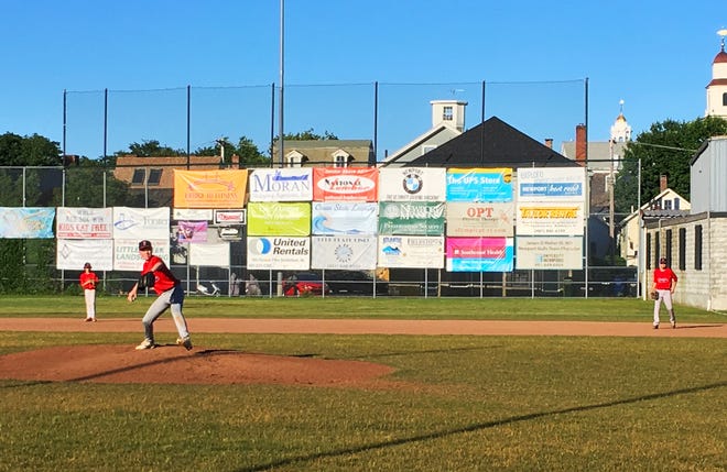 With recently added protective netting, the right-field fence at Cardines Field in Newport is 41 feet tall. But that still doesn't keep long fly balls from hitting nearby homes. [SCOTT BARRETT / DAILY NEWS PHOTO]
