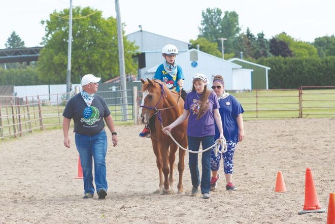 The annual 4H equestrian program held at the Cheboygan County Fairgrounds teaches children all about horses, how to ride them and how to control them once they are in the saddle.