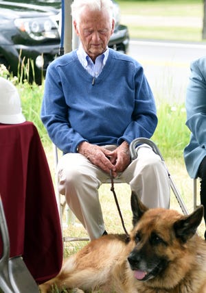 Lyman Pope and his German shepherd Max joins officials and dignitaries for a groundbreaking ceremony to mark the beginning of construction of the new Pope Memorial Cocheco Valley Humane Society facility on County Farm Road in Dover. Pope donated $1 million to the fundraising campaign. [John Huff/Fosters.com]