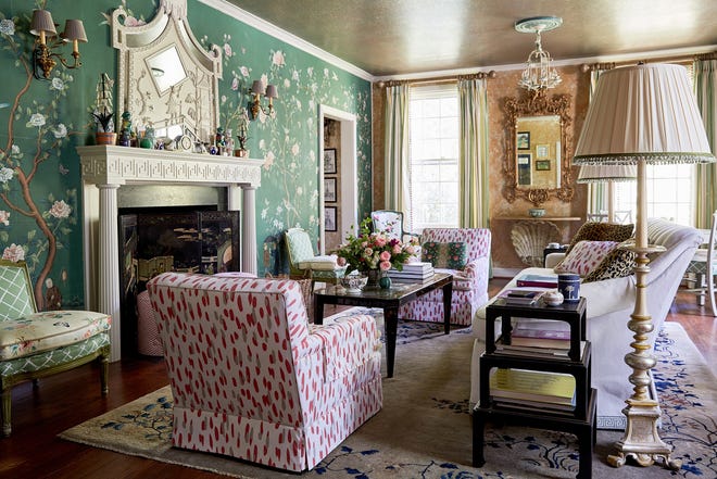 There are eight different patterns, plus an antique Chinese rug, in this living room by Jason Oliver Nixon and John Loecke. Gracie chinoiserie paper adorns the walls, while Phillip Jeffries paper adds sparkle to the ceiling. Upholstery is a mix of Madcap Cottage prints, teamed with a woven sofa banded in Greek key motif and topped with animal print pillows. [JOHN BESSLER/ONE KINGS LANE VIA UNIVERSAL UCLICK]