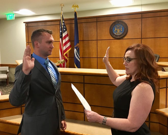 New Ionia County Assistant Prosecutor David Eberle was sworn in Thursday by Ionia County Clerk Janae Cooper. [Contributed]