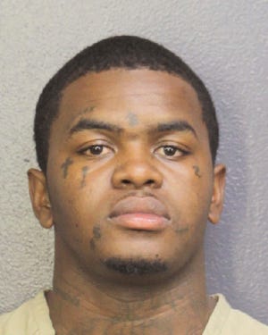 This photo provided by Broward Sheriff's Office shows Dedrick Devonshay Williams. The Broward Sheriff's Office said in a news release sent Thursday, June 21, 2018, that Dedrick Devonshay Williams was arrested shortly before 7 p.m. Wednesday n the shooting death of rapper XXXTentacion. The 20-year-old rapper was ambushed by two suspects as he left an upscale motor sports dealership Monday afternoon. The rapper, whose stage name is pronounced "Ex Ex Ex ten-ta-see-YAWN," was shot while in his sports car. Williams is charged with first-degree murder without premeditation. He's being held without bond in the Broward County Jail.  (Broward Sheriff's Office via AP)