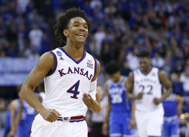Former Kansas basketball guard Devonte' Graham was taken with the No. 34 overall pick in Thursday's NBA Draft at Barclays Center in Brooklyn, N.Y. Graham's draft rights were then traded by the Atlanta Hawks to the Charlotte Hornets. [Chris Neal/The Capital-Journal]