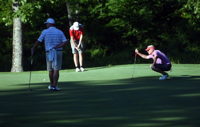 Craig Steckowych of Portsmouth CC, lines up a putt as he plays with Ryan Quinn and Michael Flynn during the first round of Seacoast Am that kicked off at The Oaks on Thursday. Steckowych is tied for sixth after the first day.
[Deb Cram/Fosters.com]