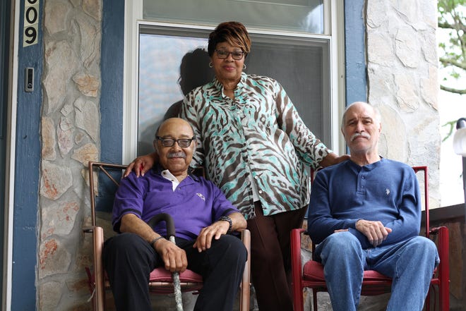 Caregiver Joann West takes care of veterans Ralph Stepney (left) and Frank Hundt at her home in Baltimore. (Lynne Shallcross/KHN)