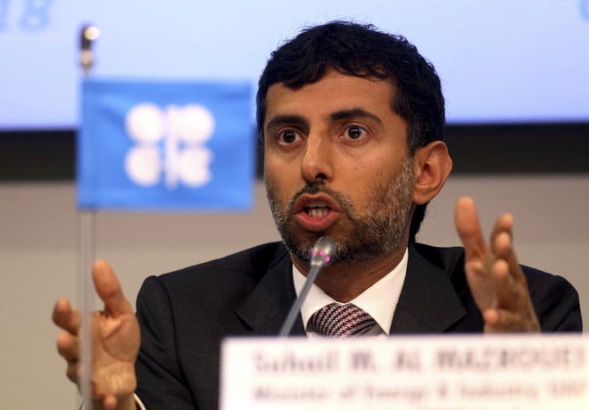 Minister of Energy of the United Arab Emirates Suhail Mohamed Al Mazrouei attends a news conference after a meeting of the Organization of the Petroleum Exporting Countries at their headquarters in Vienna, Austria, Friday. [AP Photo/Ronald Zak]