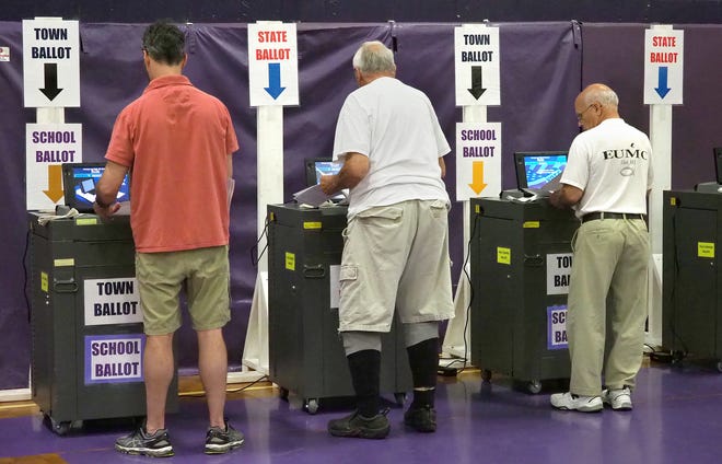 Voters line up at ballot boxes at Marshwood Middle School in Eliot, Maine, during the state primary election on June 12. [Rich Beauchesne/Seacoastonline]