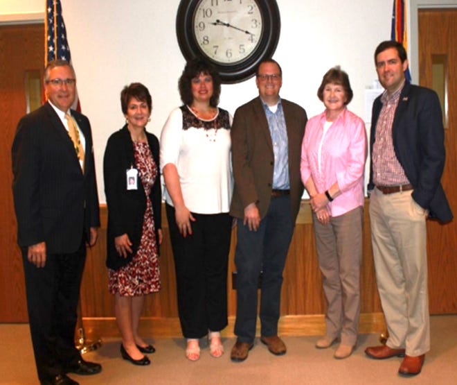 From left, are Rick Bissler, president of PARTA Board of Trustees; Claudia Amrhein, PARTA general manager, Portage County Commissioner Sabrina Christian-Bennett; Curtis Baker, director of AMATS; Portage County Commissioner Vicki Kline; and Portage County Commissioner Michael Kerrigan.