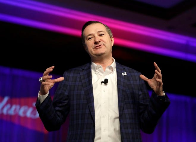 In this Friday, Jan. 12, 2018 file photo, Chicago Cubs Chairman Tom Ricketts talks to the crowd during the Cubs' annual convention, in Chicago. The Ricketts family that owns the Chicago Cubs says it is negotiating to purchase the debt-ridden AC Milan soccer team. The Milan office of the Edelman public relations firm, which has been hired to represent the Ricketts, says the entire family is interested in Milan for "a medium- to long-period investment" and wants to create "a strong bond with the city." (AP Photo/Charles Rex Arbogast)