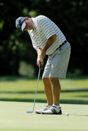 Nick Lambos putts on the No. 2 hole on the final day of the 2017 Stark County Amateur Golf Championships at Seven Hills Country Club. Lambos won the seniors 50-59 division. (Ray Stewart/GateHouse Media Ohio)