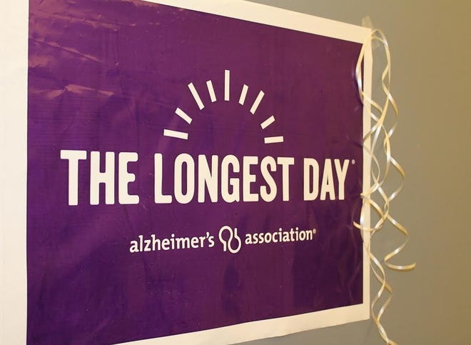 When the Alzheimer’s Association learned the M.M. Ewing Continuing Care Center wanted to participate in The Longest Day this year, the organization sent banners, purple bracelets, photo booth props and more items to make the event more festive. [PHOTO PROVIDED]
